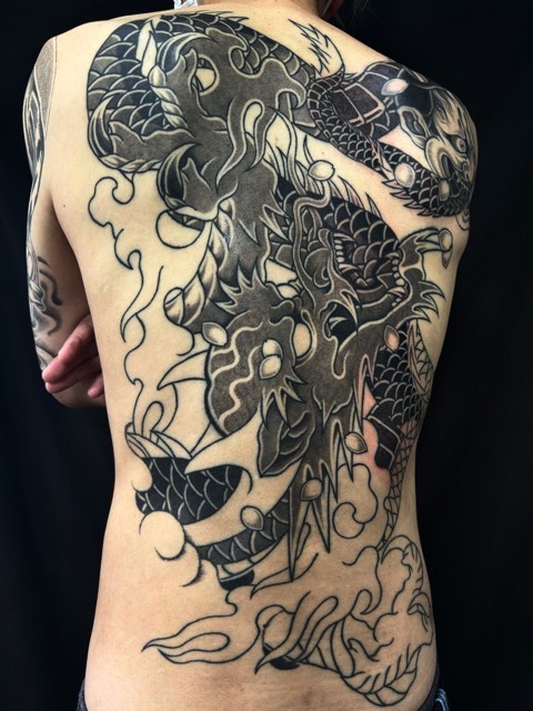 龍・桜花弁・般若面の刺青、和彫り(Japanese Tattoo・タトゥー)の画像