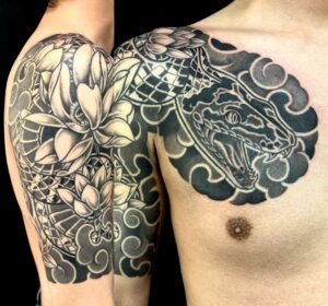 蛇・蓮の花(五分袖)の刺青、和彫り(Japanese Tattoo・タトゥー)の画像