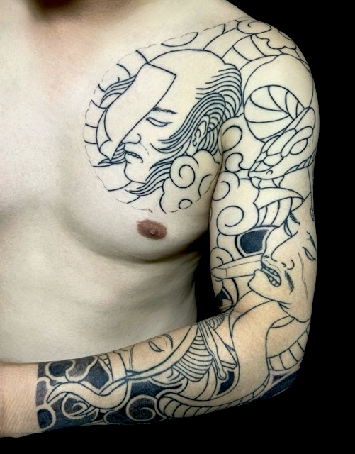 蛇・生首(長袖)の刺青、和彫り(Japanese Tattoo・タトゥー)の画像