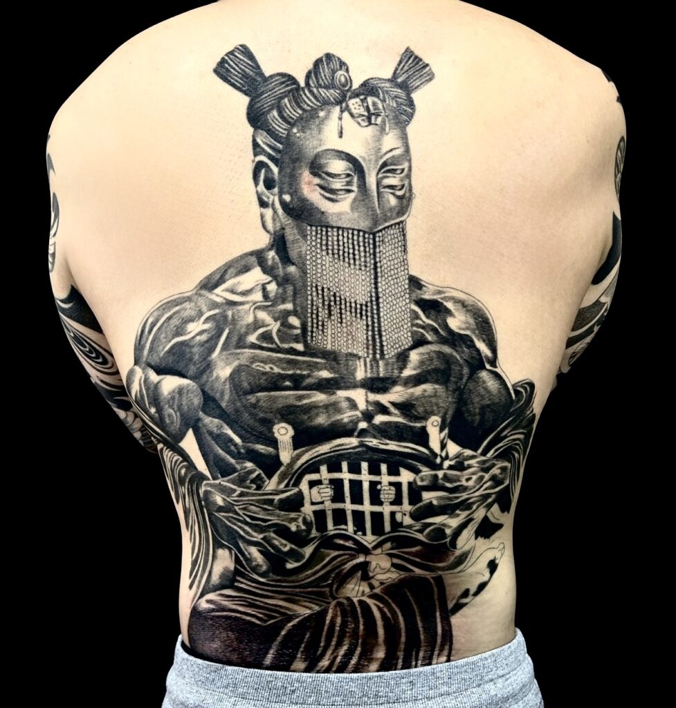 蛮幽像(背中抜き彫り)の刺青、和彫り(Japanese Tattoo・タトゥー)の画像