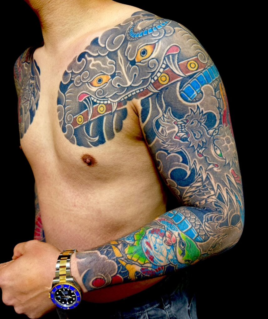 水門・龍・蛙(額彫り長袖)のタトゥー・刺青・和彫画像